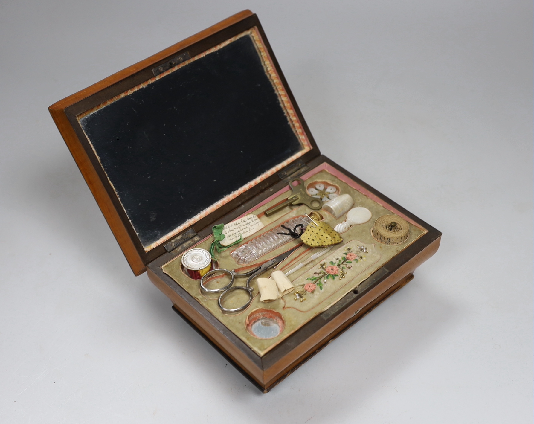 An early 19th century French West Indies satinwood and cut-steel musical sewing box, 19cm wide, 9cm high